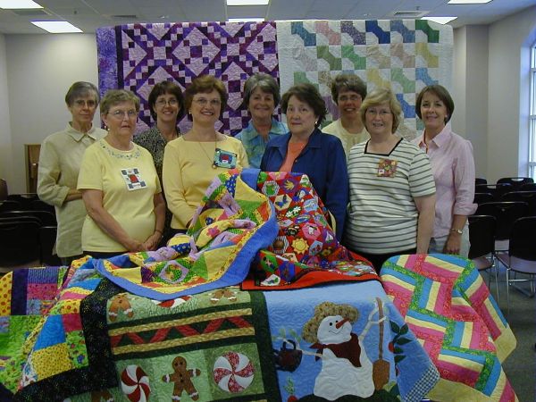 Sewn In Love quilting volunteers