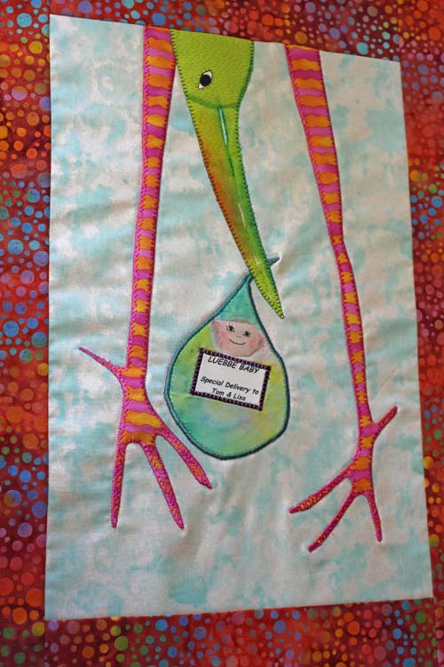 add fabric borders to stork quilt