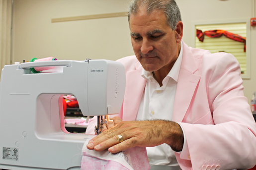 man at sewing machine