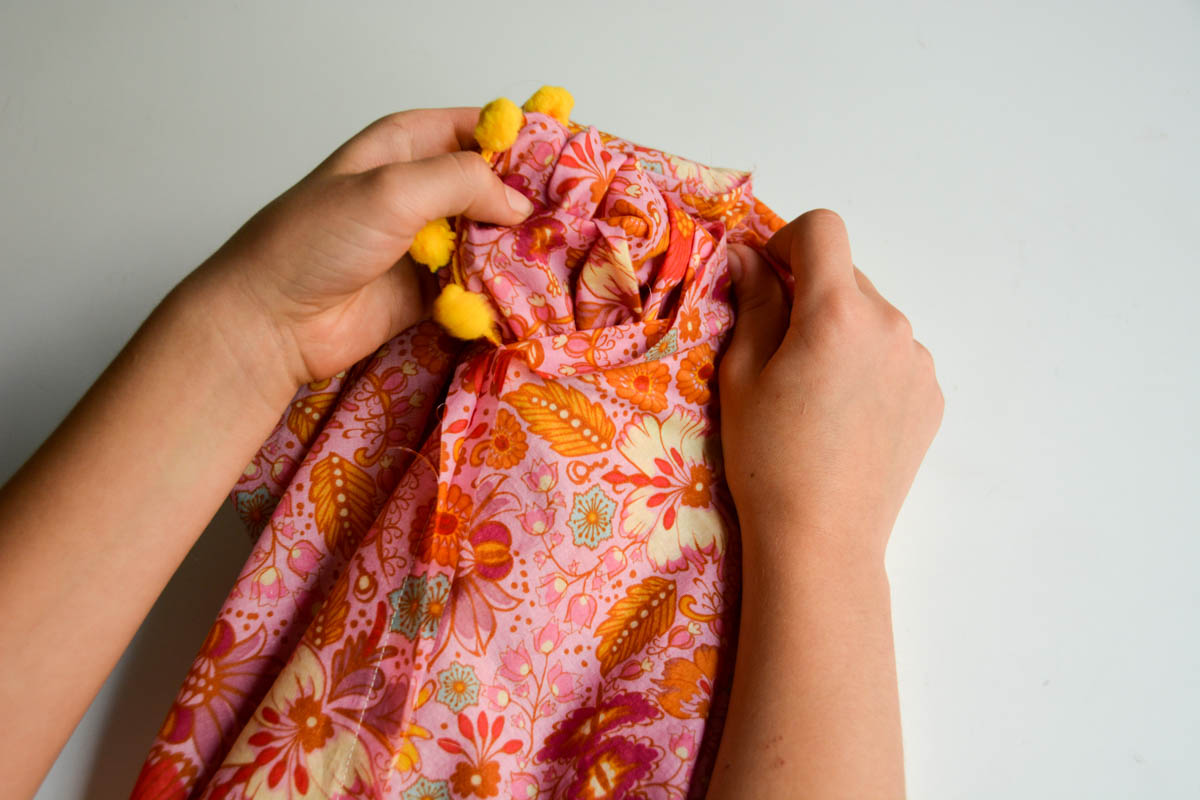 PomPom Scarf Sewing Tutorial-turning scarf inside out 2