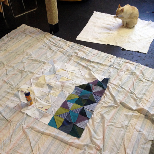Use temporary spray adhesive to baste the quilt