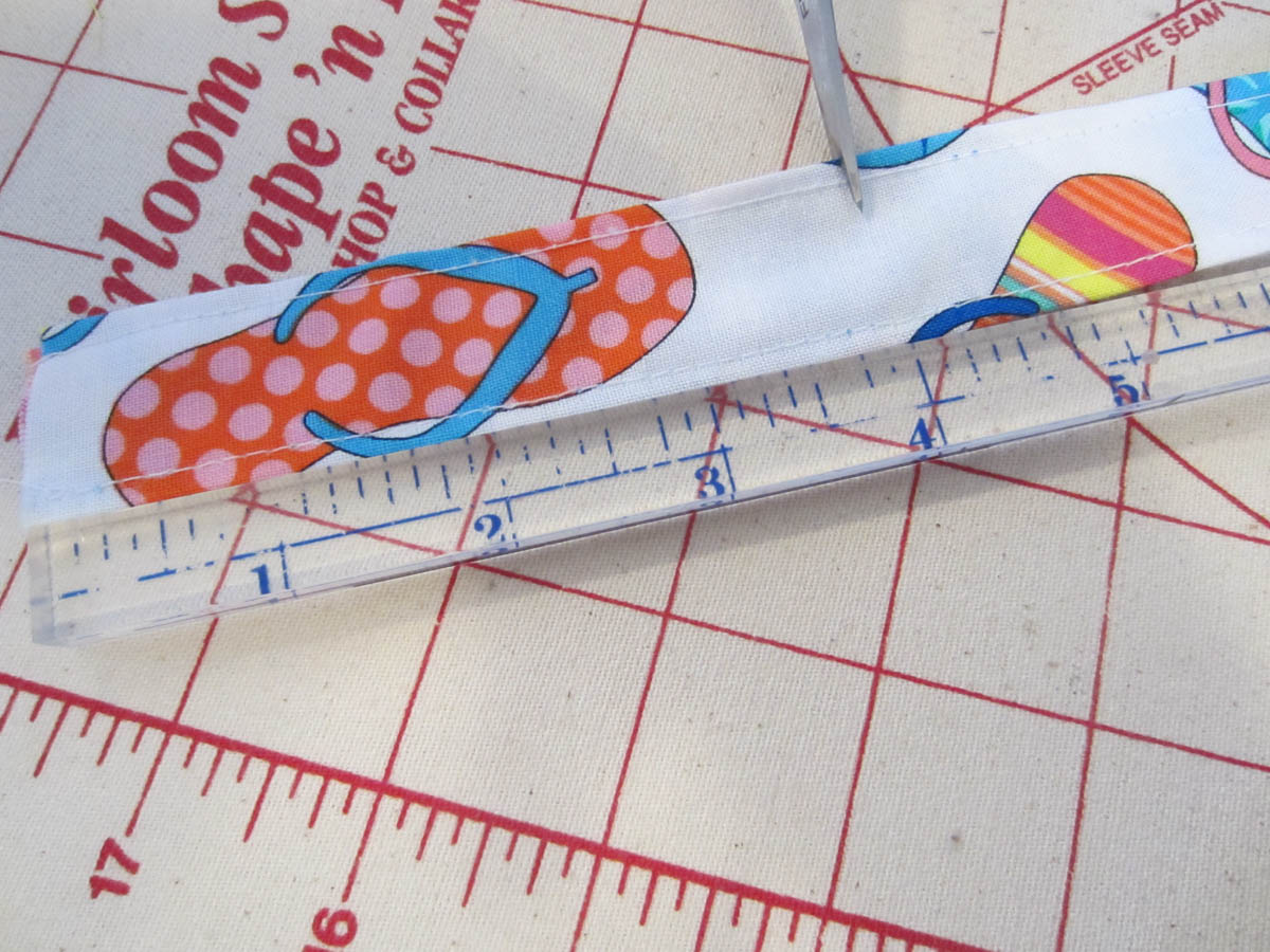 Swim Wetbag Sewing Tutorial - Cut a 4″ segment from finished strip