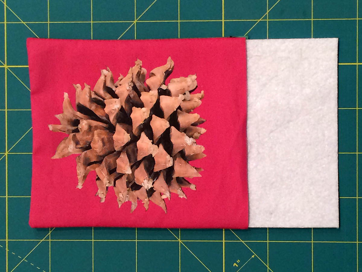 Holiday Coasters Tutorial - Slide the piece of fusible interfacing into your coaster pocket
