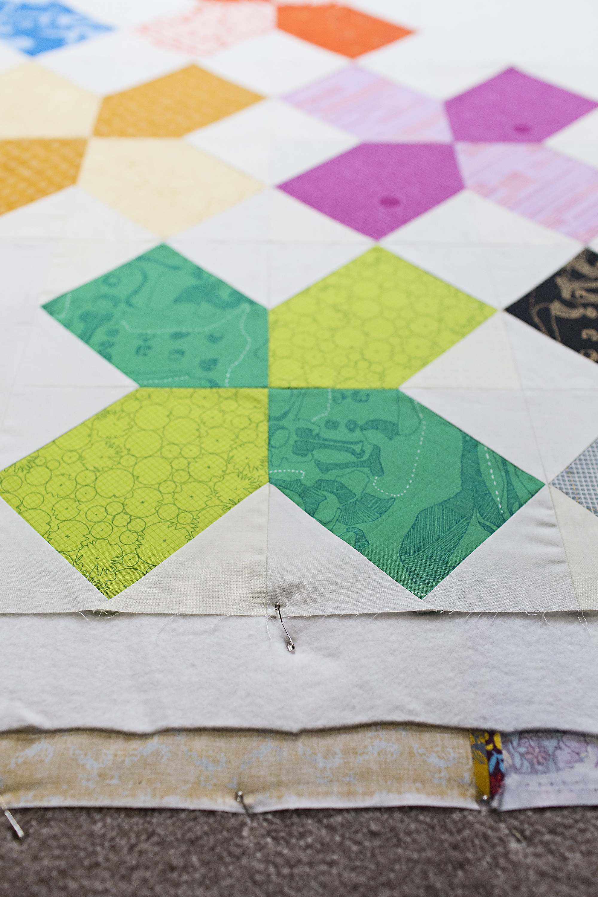 This is the #1 basting method for quilts. (Say GOODBYE to pins