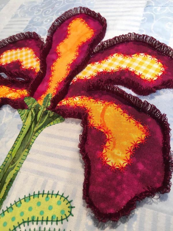 Decorative Stitching with the BERNINA Tailor Tack Foot - flower close-up