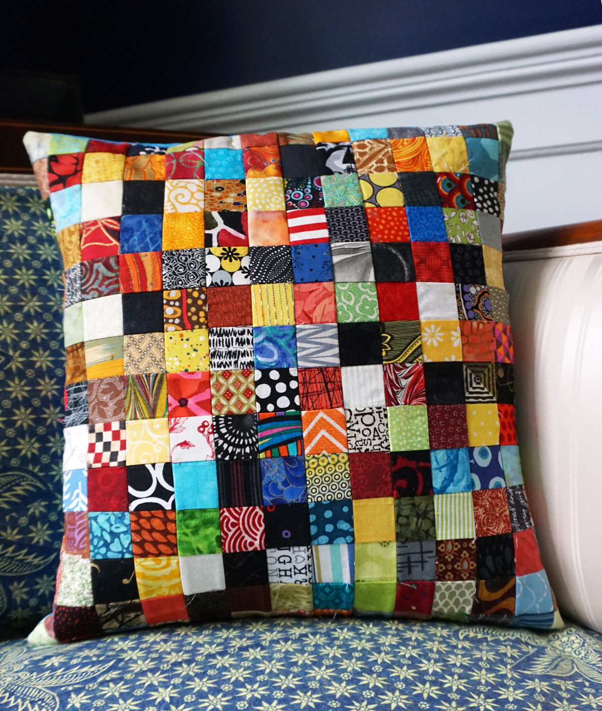Postage stamp patchwork pillow