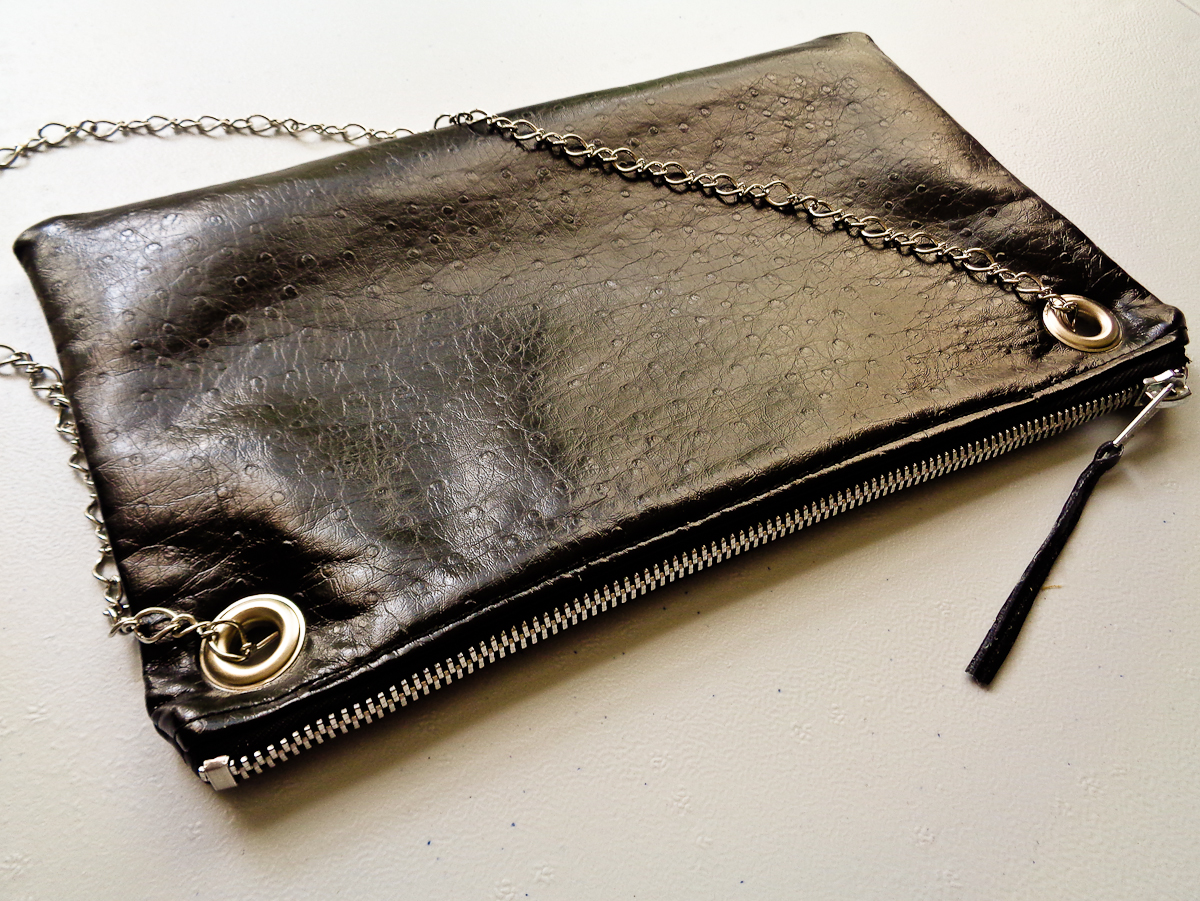 Clutch wallet with discount strap