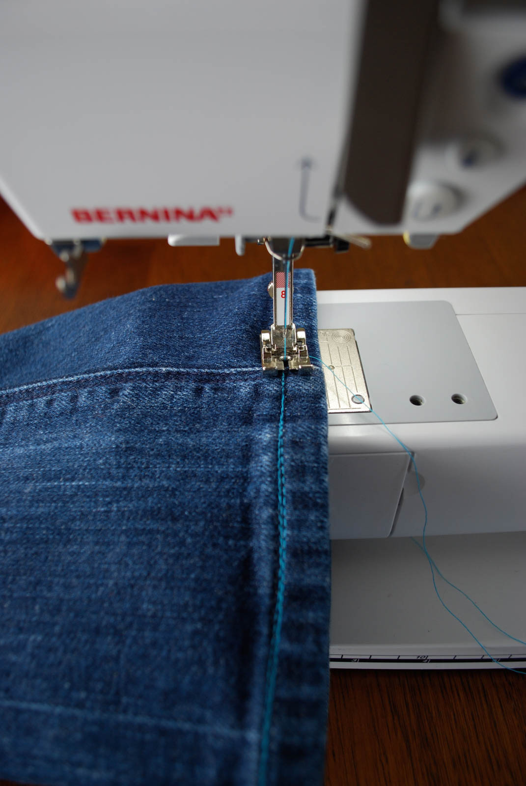 Toddler Backpack first step is to topstitch the seam of the jean leg ...