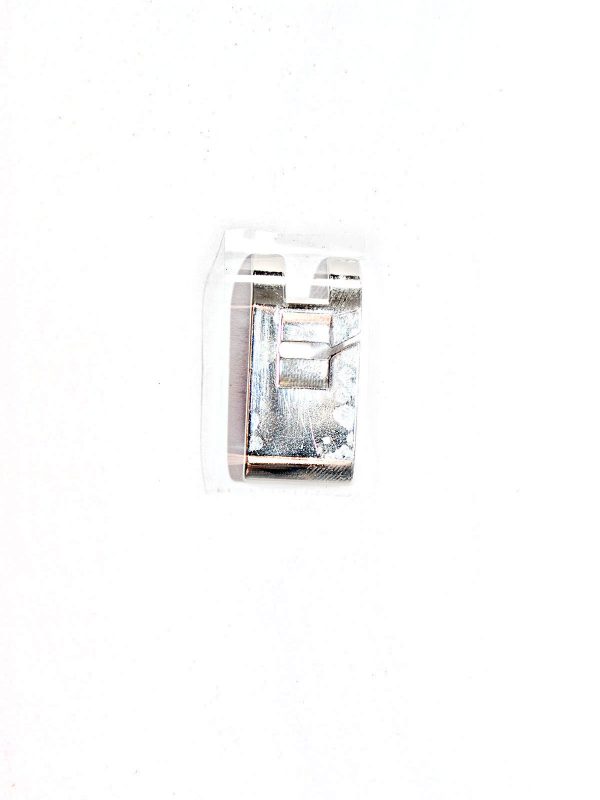 Tape on the bottom of the presser foot