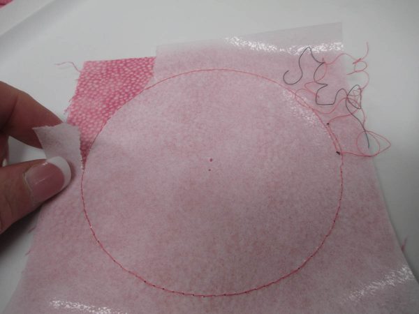 How to Create Yo-Yos with the BERNINA Circular Embroidery Attachment - gently tear away the stabilizer from both sides of the stitching