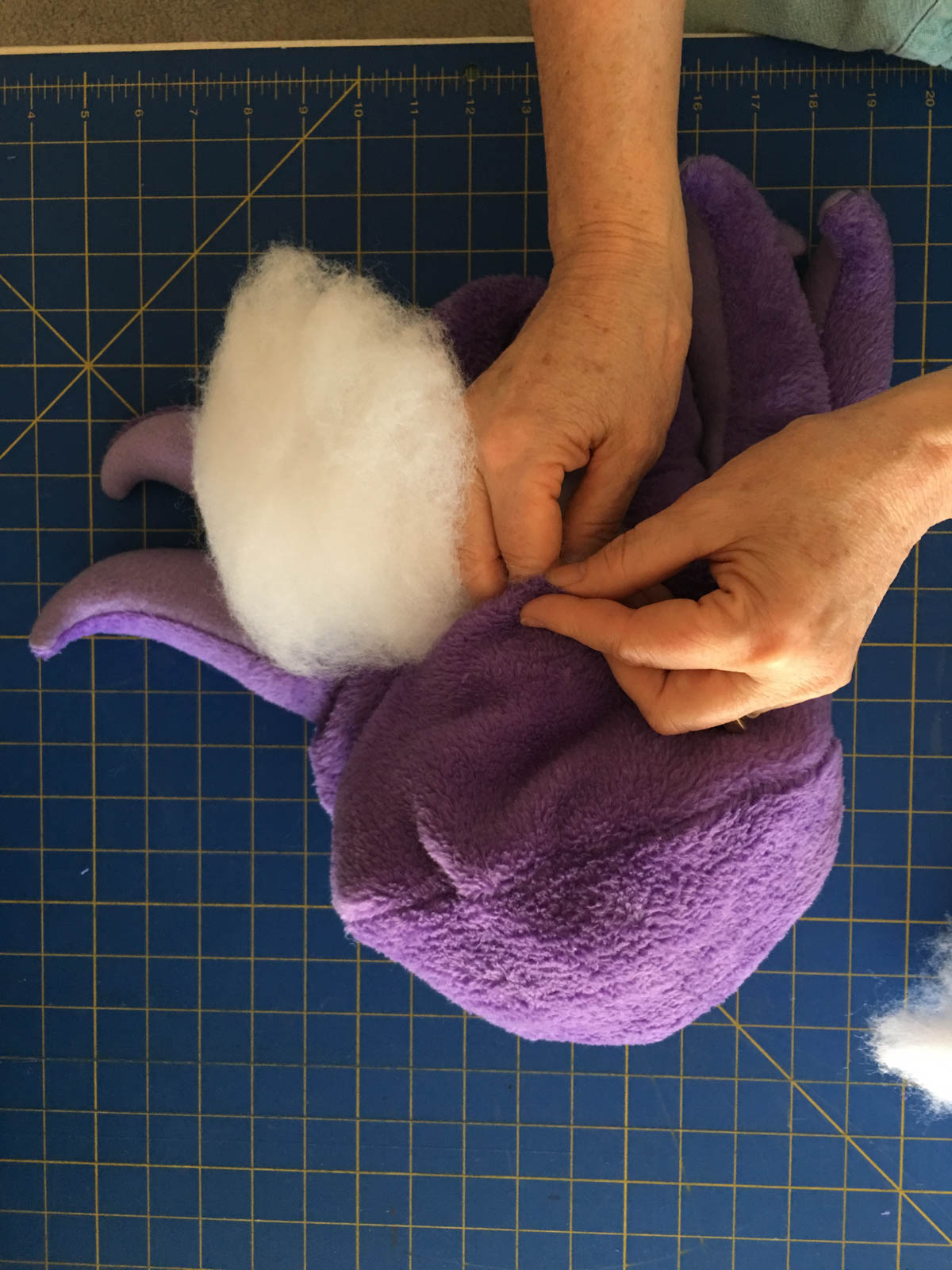How to sew Stubby the Squid - How to sew Stubby the Squid - How to sew Stubby the Squid - 18. Stuff with polyester stuffing
