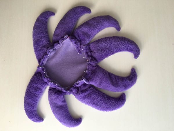 How to sew Stubby the Squid - pin legs onto lavender head 