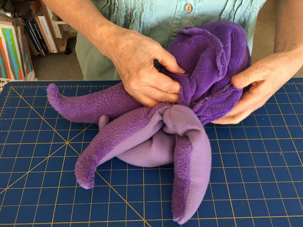 How to sew Stubby the Squid - Gently pull one toe at a time out of head to turn right side out