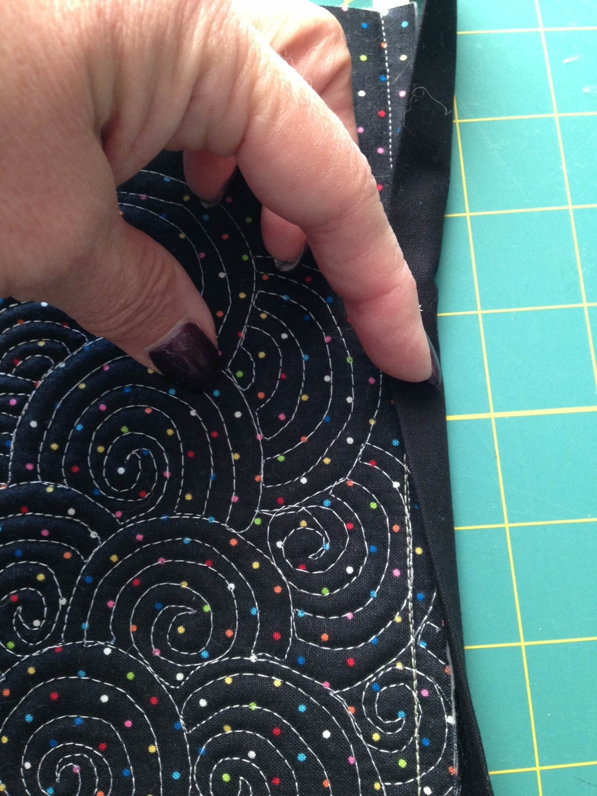 Moon Wall Hanging-binding at the front of the quilt