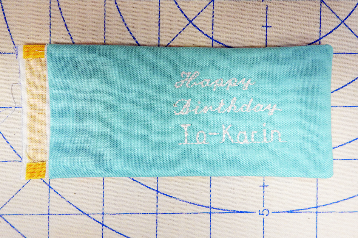 Personalized Fabric Gift Tag Step 7: Pressing the tag after turning right side out.
