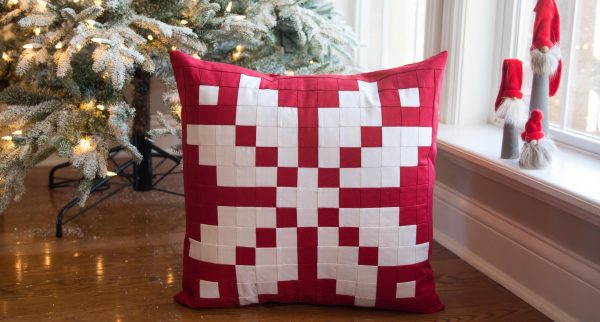 Patchwork Nordic Inspired Snowflake pillow pattern by Melissa Mortenson for WeAllSew