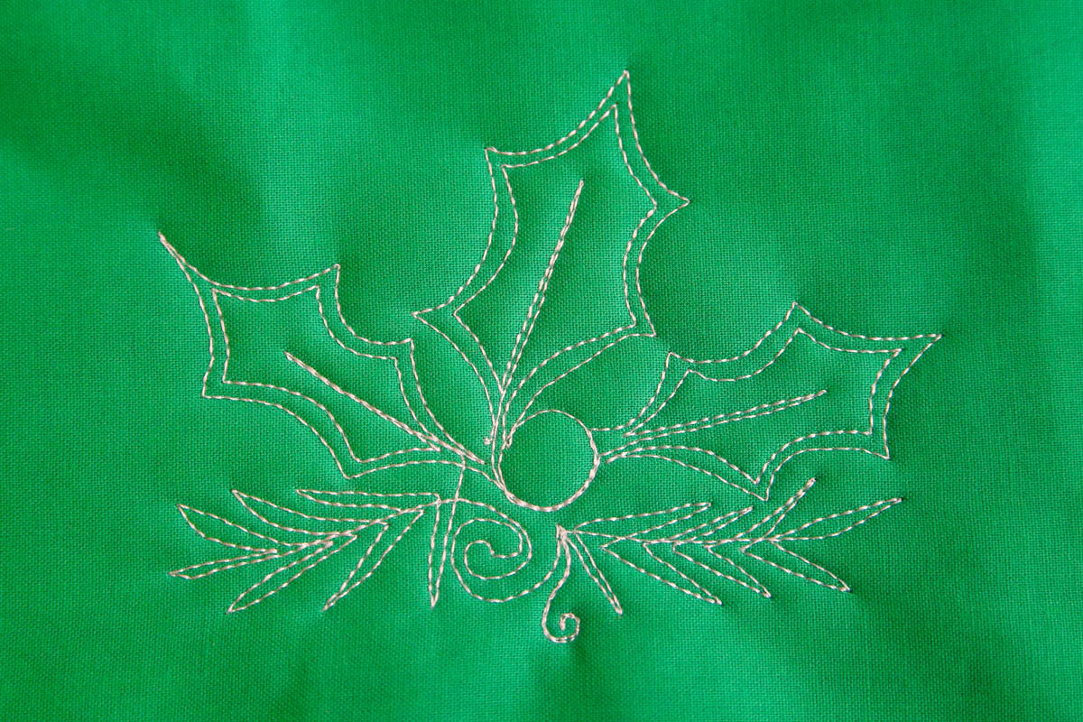 Free-motion Quilting Pine Boughs and Holly-combine holly, leaves and bouhgs