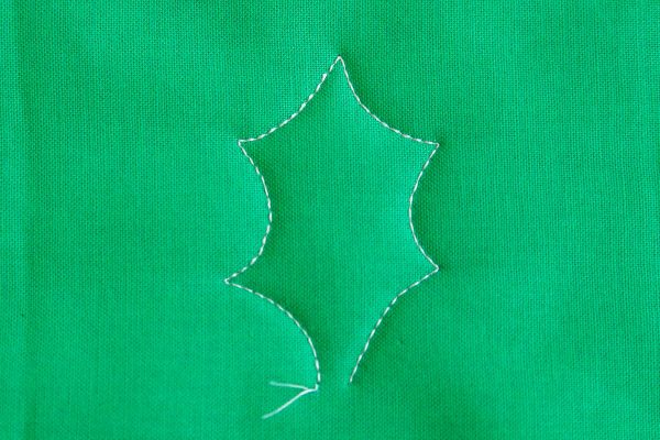 Free-motion Quilting Pine Boughs and Holly-Stitch the right side of the leaf 