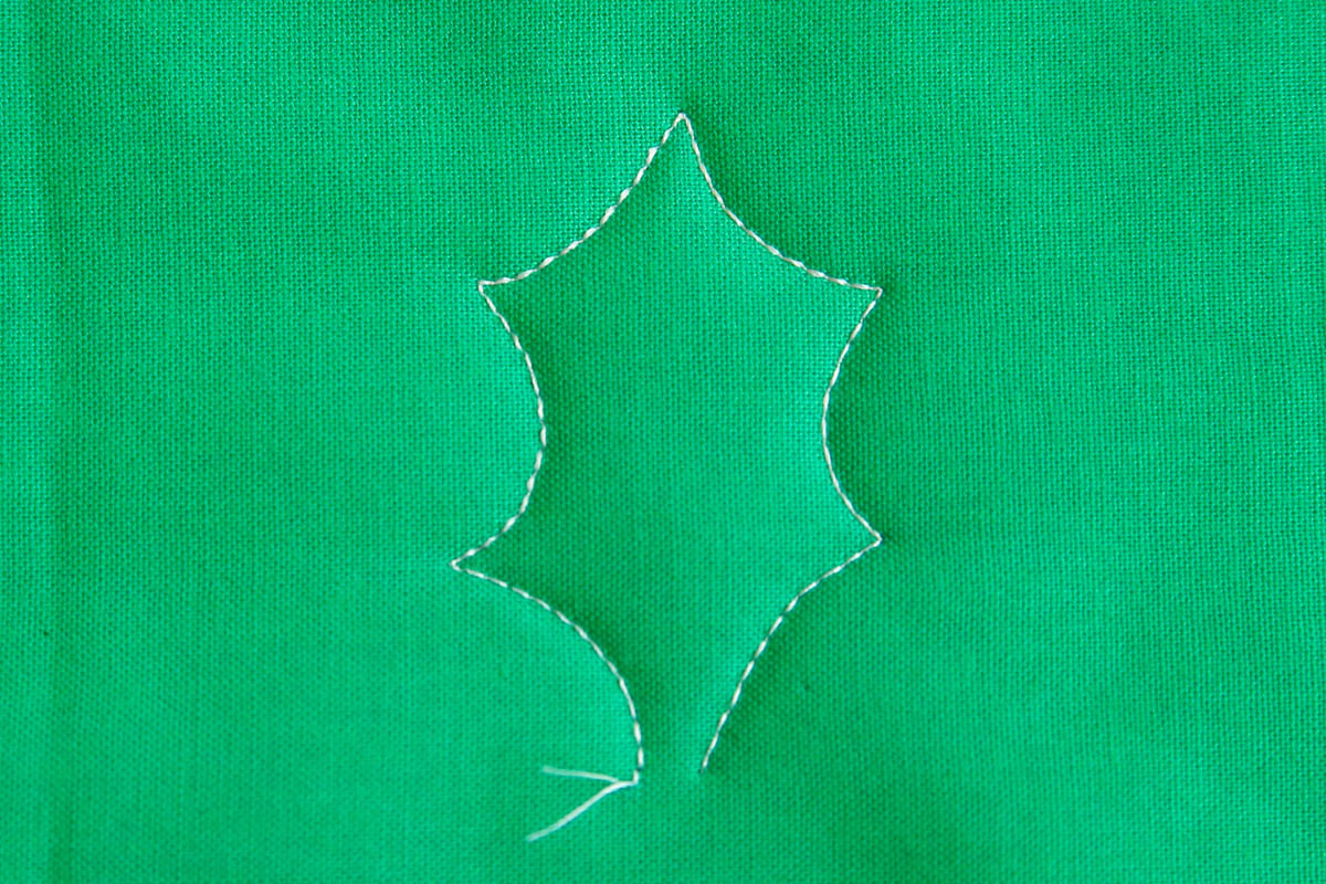 Free-motion Quilting Pine Boughs and Holly-Stitch the right side of the leaf