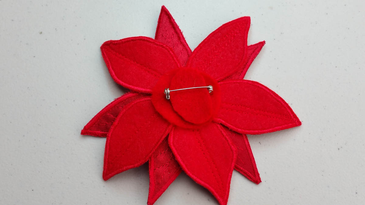 Poinsettia Pin-Secure in place with Fabri-tac glue