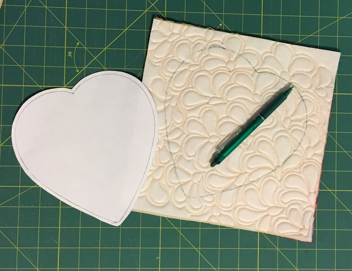 Chocolate Box Cover and Mug Rug-trace the heart pattern on the wrong side of the quilted square