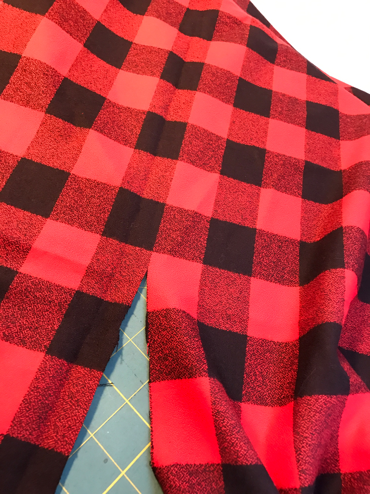DIY Blanket Scarf-Cut the fabric horizontally along one of the plaid lines across the center