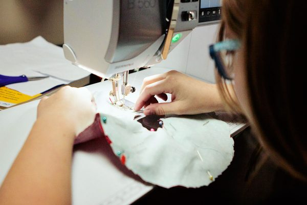 kid sewing on a BERNINA 560