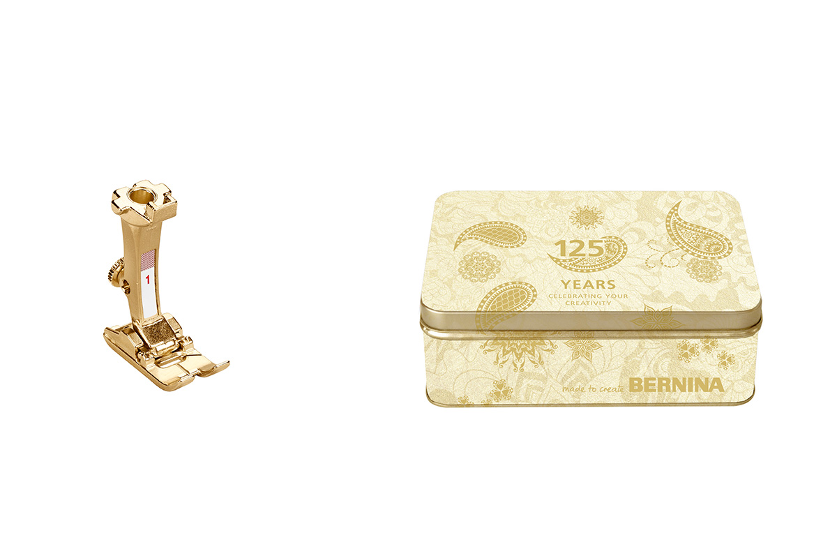 BERNINA Reverse Pattern foot #1 in gold and Anniversary Edition tin