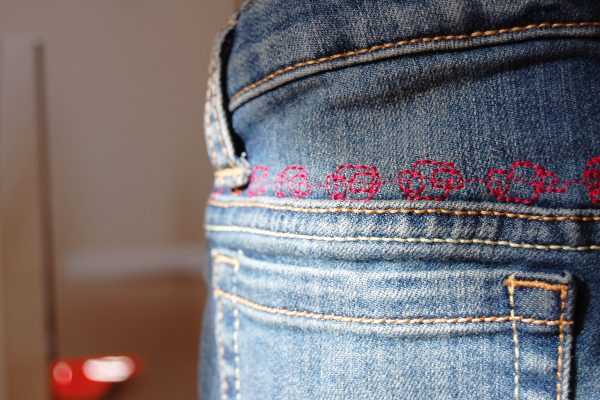 Adding decorative stitches to jeans
