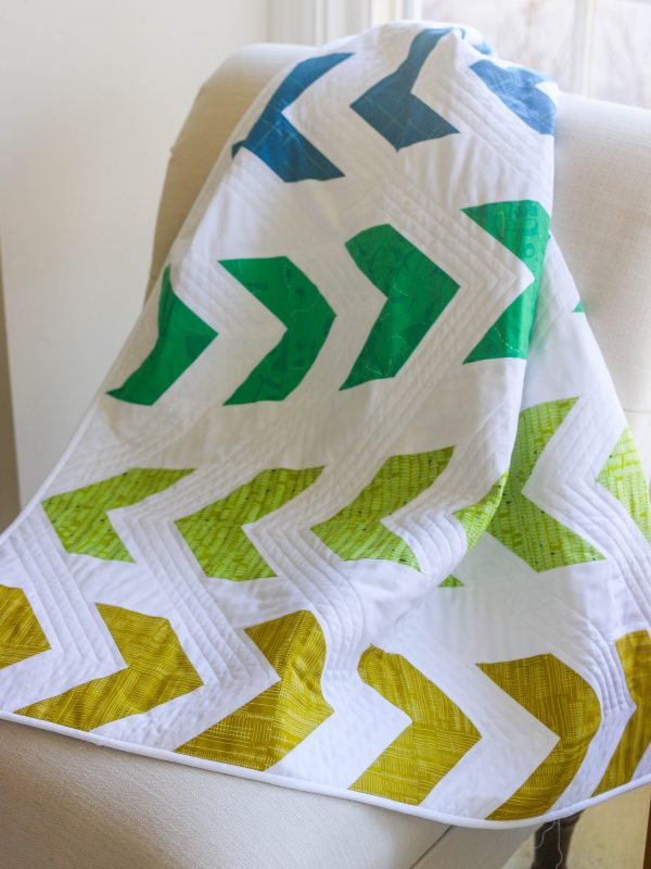 Arrow Baby Quilt with half-square triangles by Lee Heinrich