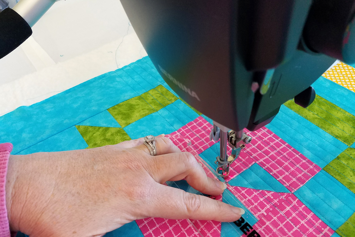 Straight Line Quilting with Q-matic, ruler closeup