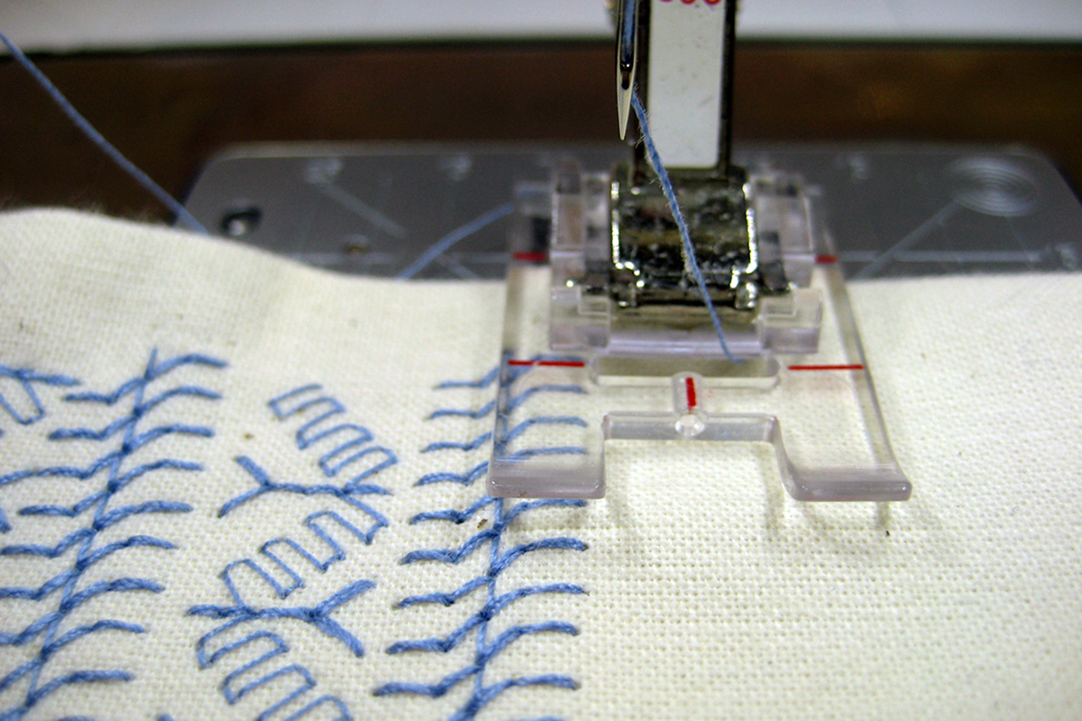 Stitching four rows of decorative stitches