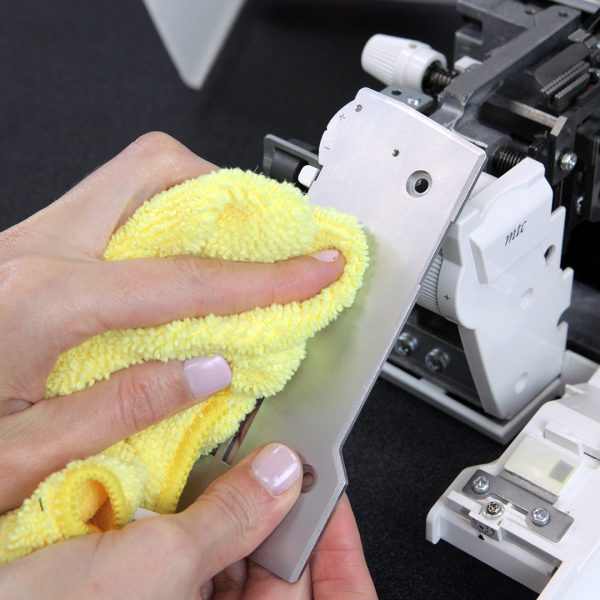 Overlocker Care Cleaning - clean stitch plate