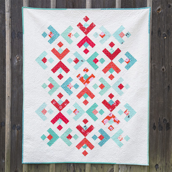 Winter holiday snowflake quilt at WeAllSew