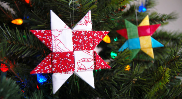 I've been playing with making folded Danish stars (sometimes called a German or Froebel star) from fabric to decorate for the holidays. While there's a few methods you can use to create these folded stars from fabrics, I found that using sewn strips reduced some of the bulk and creates nice, crisp corners. There's just one straight line seam in these stars, the rest is all folding!