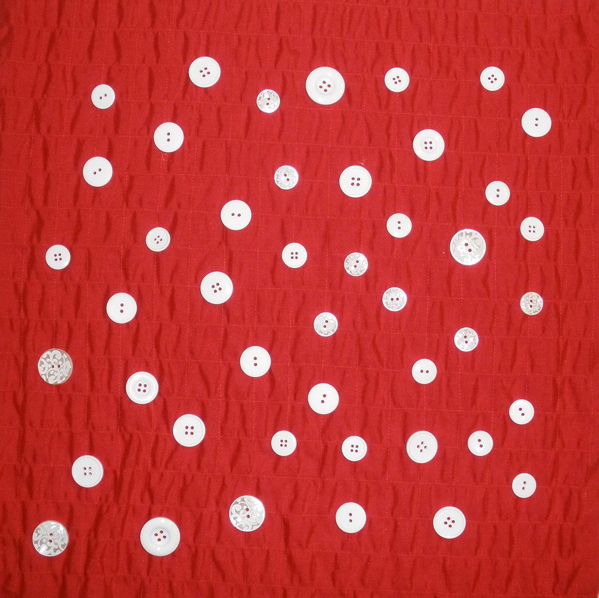 Randomly_Placed_Buttons_on_Pillow_Top