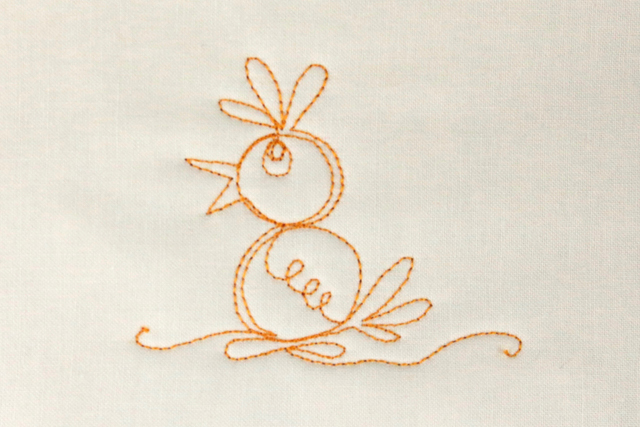 Free-motion stitched baby chick