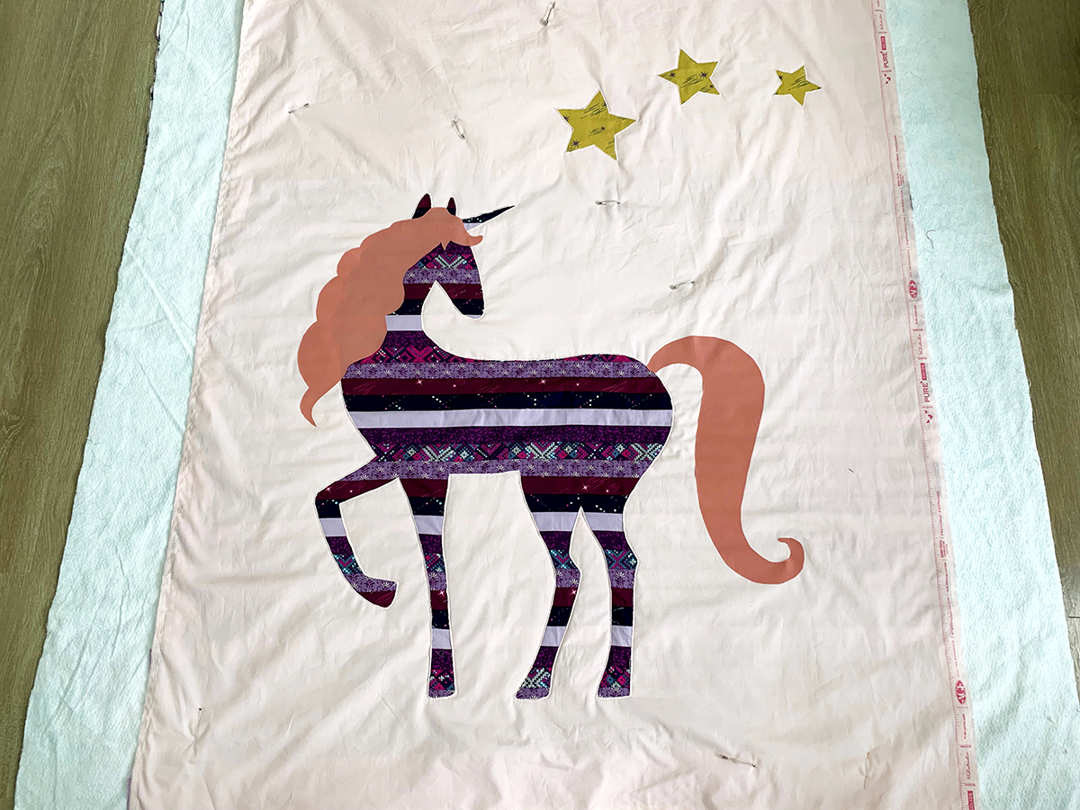 Reverse Appliqué Unicorn Quilt Tutorial - WeAllSew