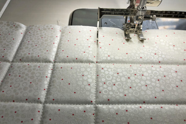 Free-motion couching with rulerwork from WeAllSew