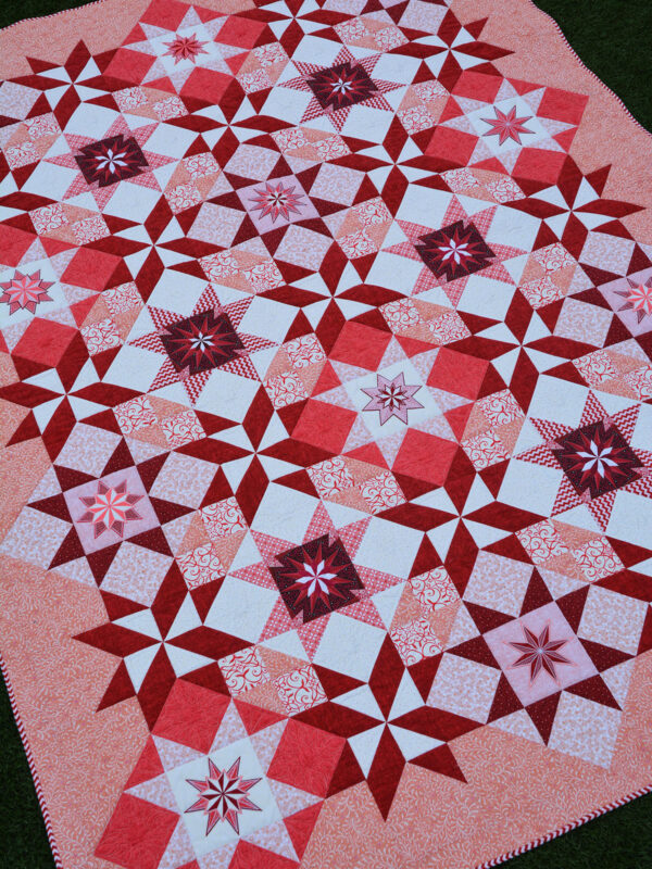 The red version of the Stardust Quilt by Amanda Murphy