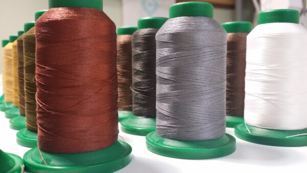 Array of Isacord Embroidery thread spools 