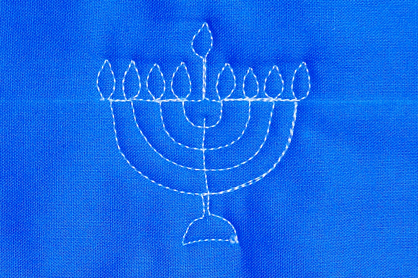 How to Free-Motion Quilt a Menorah from WeAllSew