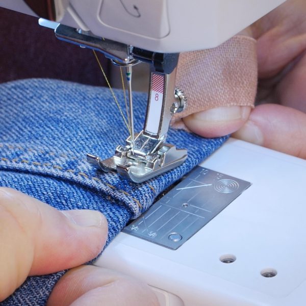 How to easily hem Jeans - place hem on machine