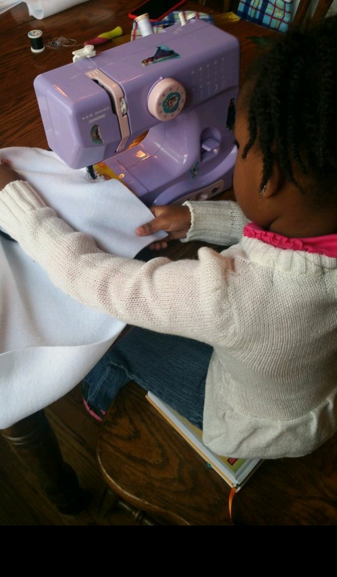 Paris Green Sews at the age of four