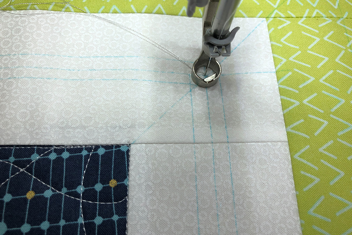 Longarm Quilting for Beginners Part 2: Loading a Frame - WeAllSew