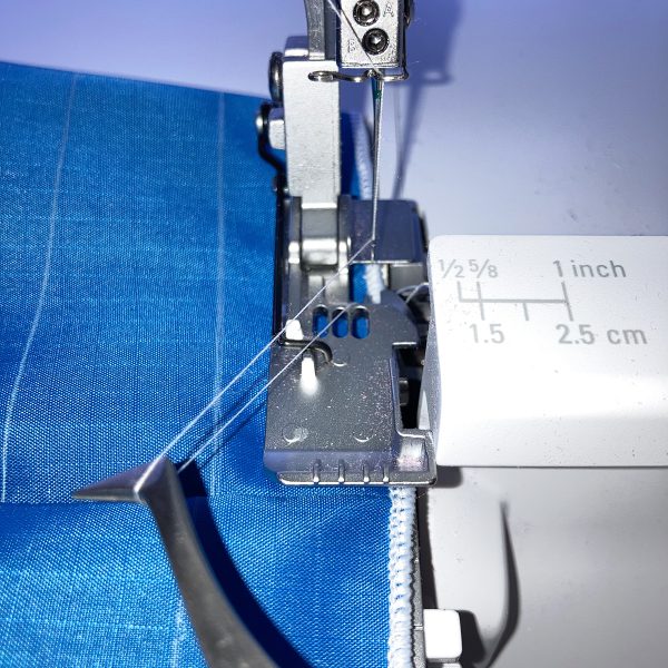 Serge_The_Unusal_Windsock_11_Pulling_needle_thread_BERNINA_WeAllSew_Blog_1200x1200px