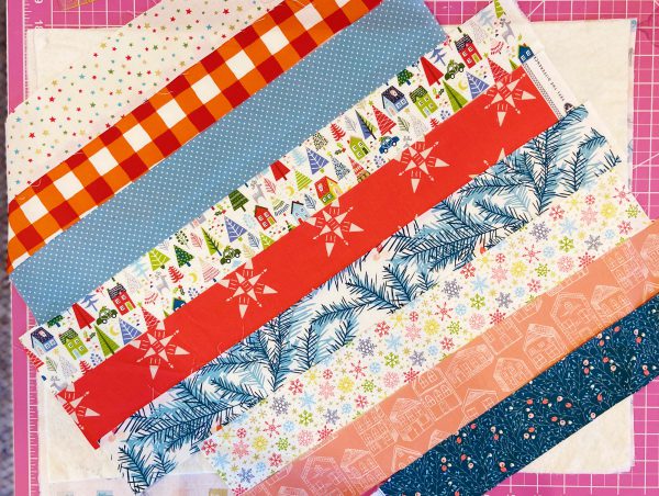 How to Quilt Christmas Stockings as You Go - Strips BERNINA WeAllSew Blog 600 x 452