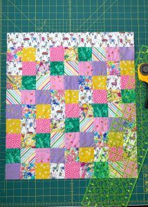 Trim batting and square up patchwork quilt