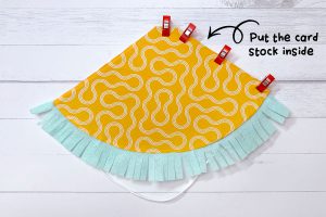 Fabric-Covered-Party-Hat-Step-5-insert-card-stock-and-topstitch