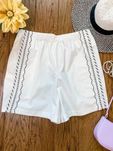 Flat Lay White Shorts with Black Decorative Stitching